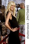 Small photo of Kimberly Stewart attends the Los Angeles Premiere of "Mr. & Mrs. Smith" held at the Mann's Village Theater in Westwood, California on June 7, 2005.
