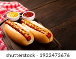 Hot dog with ketchup and yellow ...