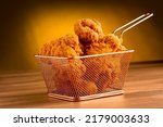 Crispy fried chicken in the basket.