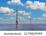 Wind Turbines Off The Shores Of ...