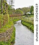 Small photo of The small river Gulp in the small town Gulpen
