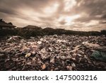 A huge amount of waste from the houses and industrial factories that were left without consciousness. Garbage dumps that cause greenhouse gases or global warming.