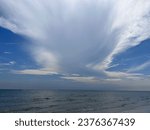 Small photo of Large scale Cumulonimbus type of cloud over the sea in Hun Hin, Thailand.
