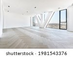 Small photo of Wall windows with triangle pillar viewing cityscape from luxury penthouse apartment with parquet flooring