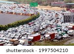 Small photo of Due to the farmers' agitation on the Gurugram Sarhol Border Expressway, the Delhi Police investigated the vehicles, which led to a long jam. Gurugram, Delhi, India. 26 June 2021.