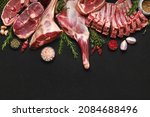 Assortment of various raw lamb cut parts with copy space