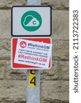 Small photo of Photo taken on 25 January 2022 in Edenfield, Greater Manchester. Brand new road sign showing the controversial Clean Air Zone which will operate from 30 May 2022. Sign defaced by protestors.