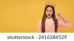 Small photo of egoistic teen girl in home terry bathrobe and princess crown, egoism. Child queen princess in crown horizontal poster design. Banner header, copy space.