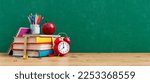 Small photo of Ready for school concept background with books, alarm clock and accessory 3D Rendering, 3D Illustration
