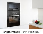 Black And Modern Built In Oven...