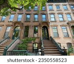 Small photo of New York, NY USA - May 29, 2023 : Front stoop and facade of the Langston Hughes House, a designated landmark, at 20 East 127th Street in Harlem, New York City
