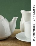 white ceramic coffee set on old ... | Shutterstock . vector #147423569