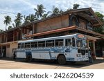Small photo of Dikwella, Sri Lanka - 23.02.2023 Regular public bus. Bus stop at Dikwella and local bus to Matara. Buses on street are most widespread public transport type in Sri Lanka.