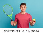 Photo of young man hold raquet...