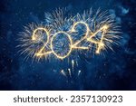 Happy New Year 2024. Beautiful creative holiday web banner or flyer with Golden firework and sparkling number 2024 on night blue sky background.