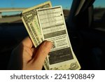Small photo of Lawrence, KS USA - December 17, 2022: Using the toll road in Kansas. Kansas Turnpike Authority. Connects Wichita, Topeka, and Lawrence. Pay per axle. Ktag.