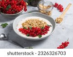 Oatmeal. Granola with yogurt and red currant