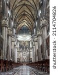 Small photo of MILAN, ITALY-12.13.2021: Inside the famous Duomo, the cathedral of Milan city, Italy, also known as Basilica of the Nativity of Saint Mary. Its construction began in 1386 and finished in 1965.