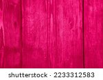 Small photo of Dark wood material texture background. Hardwood pattern In Color of the year 2023 vibrates with vim and vigor magenta