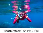 Underwater Swimming In Ocean