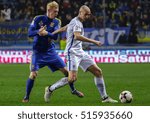 Small photo of Odessa, Ukraine - 12 November, 2016: Ukrainian player Viktor Kovalenko in fight the ball with Sakari Mattila of Finland during the FIFA World Cup 2018 qualifiying match at Chornomorets Stadium