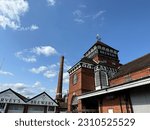 Small photo of Lewes, UK - 16.05.2023.Harvey's Brewery factory in Lewes, UK. Harvey's Brewery is a brewery in Lewes, East Sussex, England, UK. Old factory buildings.