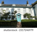 Small photo of Lewes, UK - 16.05.2023.Harvey's Yard street view in Lewes, East Sussex, England, UK. Charming medieval residential houses along the street leading to Harvey's Brewery.Lewes is the county town of East