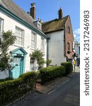 Small photo of Lewes, UK - 16.05.2023.Harvey's Yard street view in Lewes, East Sussex, England, UK. Charming medieval residential houses along the street leading to Harvey's Brewery.Lewes is the county town of East