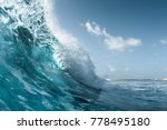 Small photo of Perfect ocean wave breaking on the shore. Surfspot named Jailbreak, Maldives