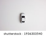 Small toy car on a white background