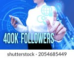 Small photo of Inspiration showing sign 400K Followers. Business overview number of individuals who follows someone in Instagram Lady In Uniform Standing Hold Phone Virtual Press Button Futuristic Tech.