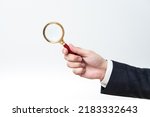 Businessman Holding Magnifier In One Hand. Man Having Magnifying Glass To Point Important Information. Gentleman Zooming Crutial Message. Executive Presenting New Idea.