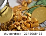 Euro banknotes, bitcoin coin, gold bracelet and gold pieces. Bitcoin mining idea. Saving and investment concept. From small investment to big investment. Gold bracelet. Selective focus.