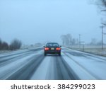 a blurred single car running on ... | Shutterstock . vector #384299023