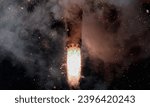 Small photo of Rocket Launch at Night Powerful Takeoff with Fiery Engine and Sparking Embers. Space shuttle rocket launch concept wallpaper. Elements of this image furnished by NASA