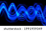 Small photo of blue light wave on black background. oscillogram abstraction