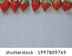 Fresh strawberries on white...