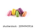 Sweet colorful macarons isolated on white background. Tasty colourful macaroons. High quality photo