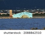 Small photo of Ibiza, Spain; November 17 2021: A house of the Ibiza salt company in the Natural Park of Las Salinas, in Ibiza