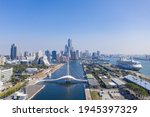 Kaohsiung, Taiwan-2021: Aerial photography of Kaohsiung City and Kaohsiung Harbor：Landscape view of Kaohsiung Pedestrian Swing Bridge (Dagang Bridge) in sunny weather.