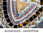 Wall sculptures with glass and tile parts. Wat Phra That Pha Son Kaew buddhist temple in Thailand.Crystal mirror glass, multi color