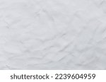 Small photo of White or grey Plasticine textured background has a rough surface. Used is House wall for background or website wallpaper. By using your hand to knead it to flatten and have fingerprints attached.