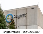 Small photo of Burlington, Ontario, Canada - October 26, 2019: Cogent sign on the building in Burlington; Cogent Power Inc is a company for electronic components such as antennas, switches, and waveguides.