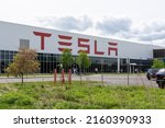 Small photo of Buffalo, NY, USA - May 23, 2022: Tesla Gigafactory 2 on South Park Avenue in Buffalo, NY, USA. Tesla, Inc. is an American automotive and clean energy company.