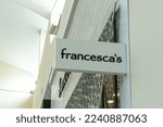Small photo of Houston, Texas, USA - March 6, 2022: A Francesca's store projecting sign at a shopping mall. Francesca's is an American boutique offering one-of-a-kind pieces for women.