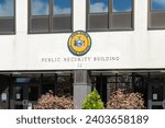 Small photo of The entrance to New York State Police headquarters in the Public Security Building at W. Averell Harriman State Office Building Campus in Albany, NY, USA, on November 12, 2023.