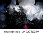 Small photo of a pile of plastic rubbish, close up of plastic rubbish, texture of plastic rubbish