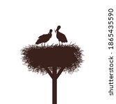 a pair of storks in their nest... | Shutterstock .eps vector #1865435590