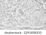 Small photo of Abstract white transparent water shadow surface texture natural ripple background