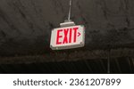 Exit sign glows brightly ...